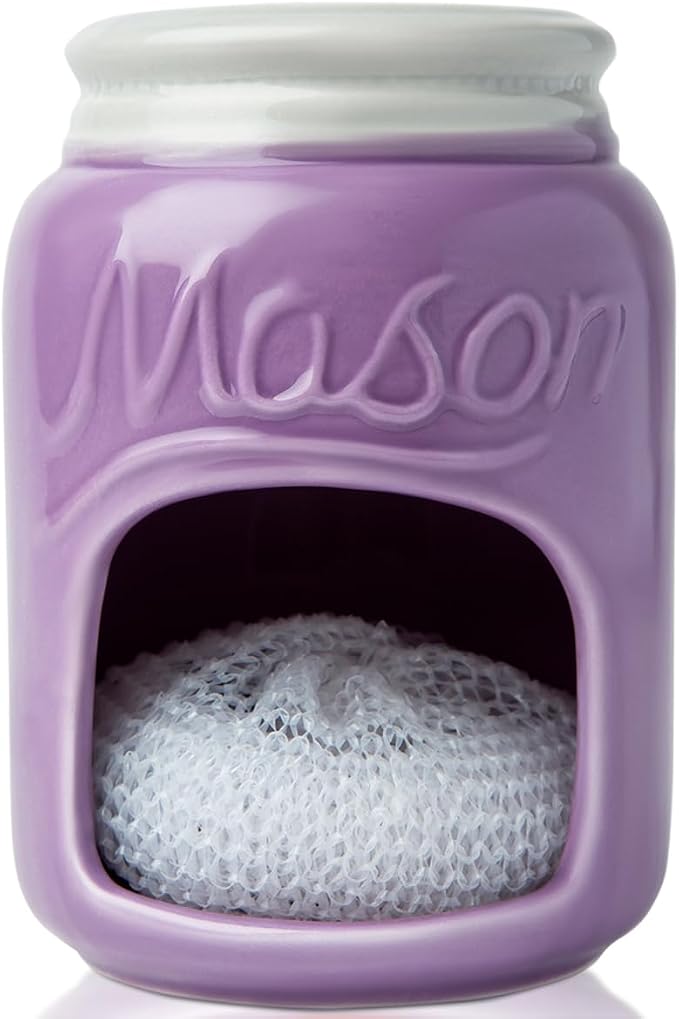 Comfify Purple Mason Jar Ceramic Sponge Holder – Farmhouse Sink Caddy | Purple; mason jar ceramic; 5"H x 3.75" diameter; includes nylon scrubby; embossed ‘MASON’; decorative lid; farmhouse