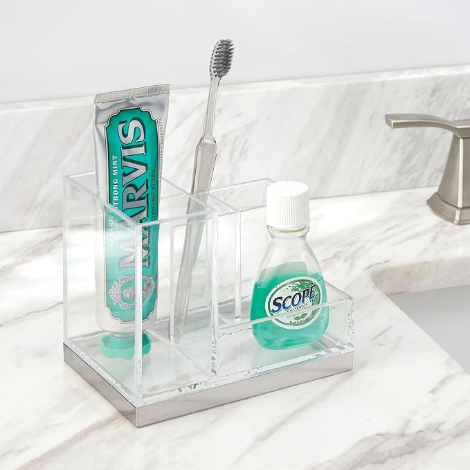 mDesign Plated Toothbrush and Toothpaste Holder, Storage Organizer Stand with 4 Compartments for Bathroom Countertop, Holders for Electric Toothbrush, Toothpaste, Hyde Collection, Clear/Brushed Chrome