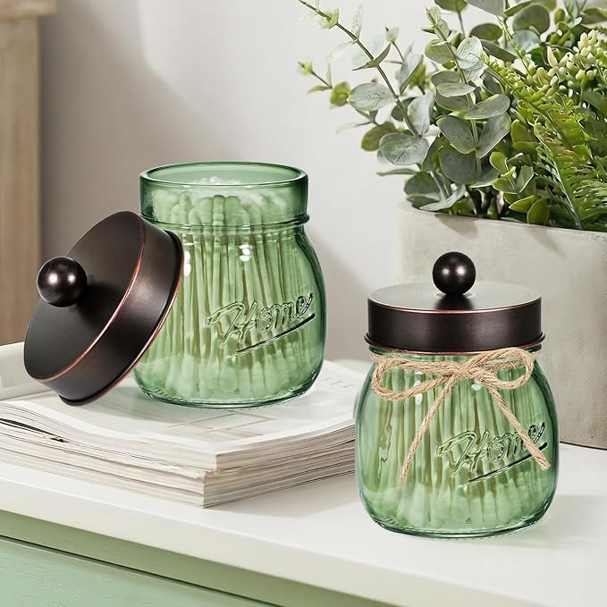 SheeChung 2 Pack Green Glass Mason Jar Qtip Holder Dispenser with ORB Lids | Apothecary Jar Canisters Set,Stainless Steel Lids,Small Bathroom Jars,Vanity Storage Organizer for Cotton Swab,Ball,Pad,Floss