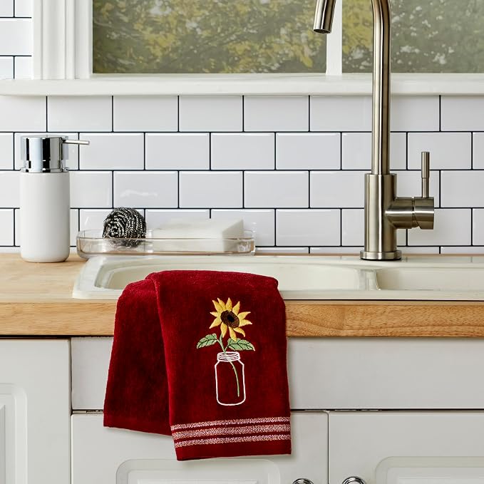 SKL Home by Saturday Knight Ltd. Sunflower In Jar 2 Pc Hand Towel Set, Wine | 100% Cotton. Soft, decorative velour. For use in the bathroom, kitchen or bar & makes a great gift.